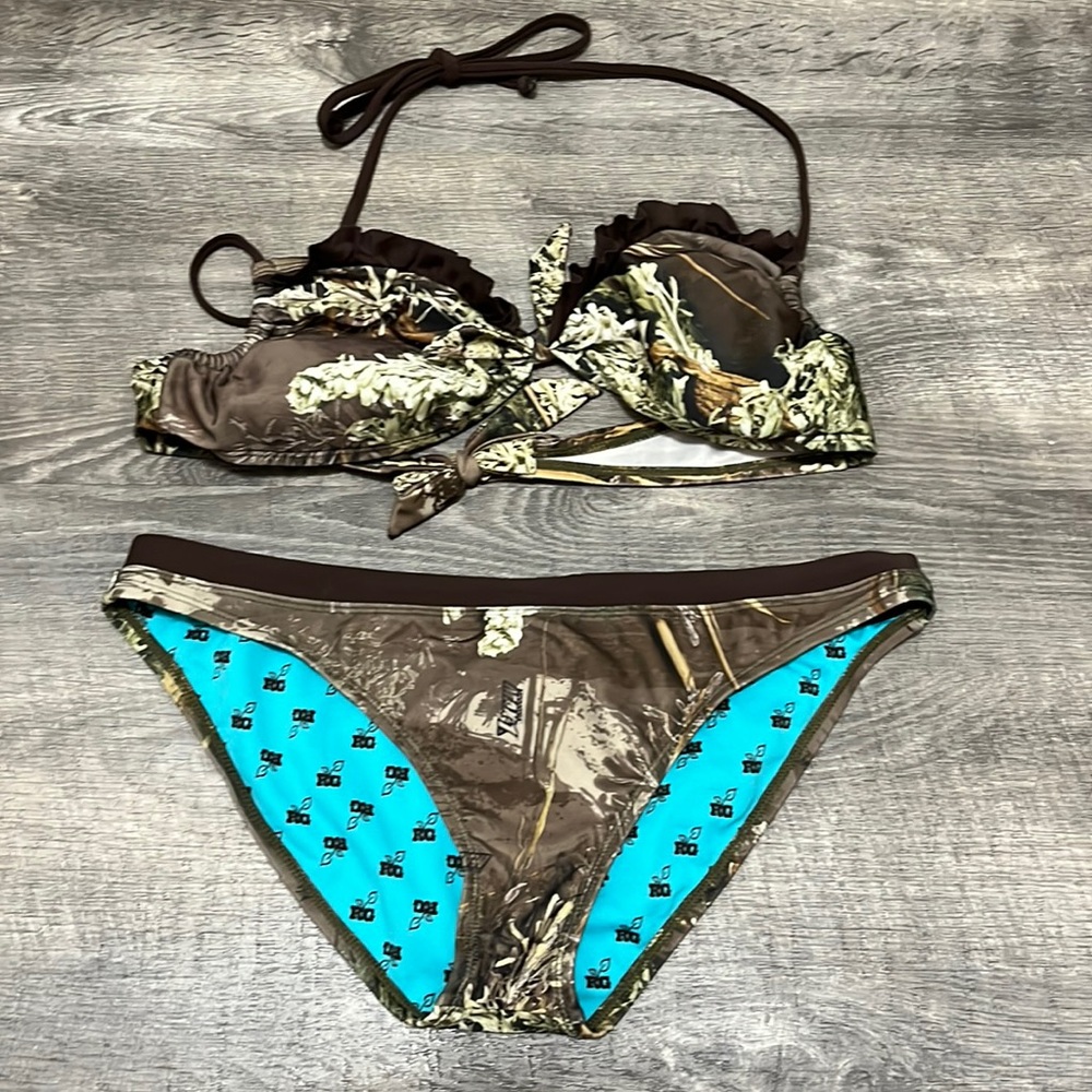 cute camouflage bikini. Ruffles on the bottom and tied in the back. Halter